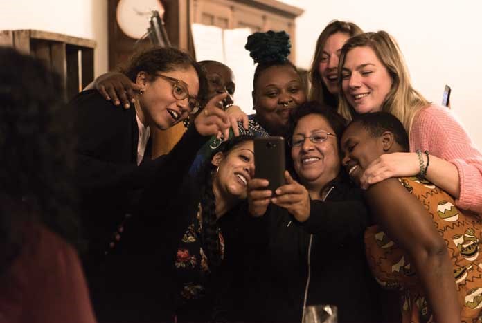 A group of international women taking a Selfie together.