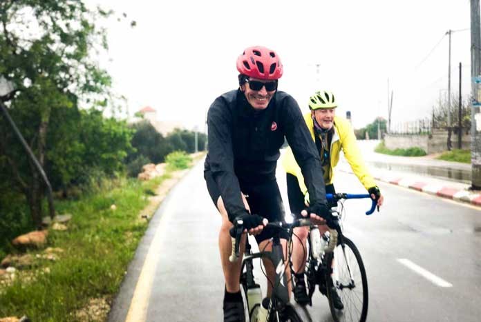 Amos Trust's Director Chris Rose cycling through the West with Amos Road Club.