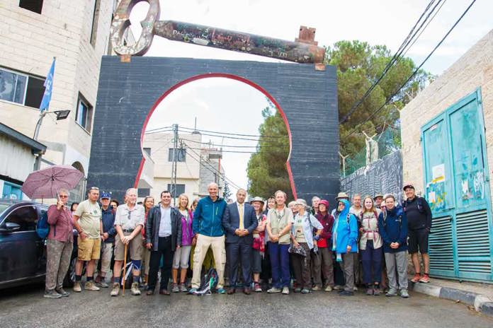 All the Walkers beneath the huge 'Aida Key', an important symbol of Palestinians right to return.