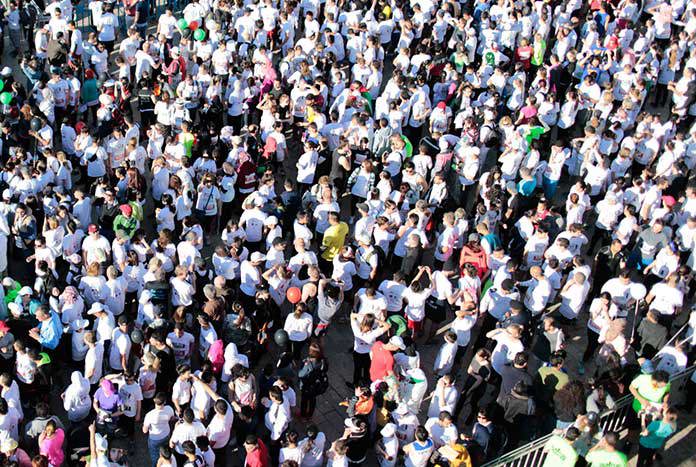 A crowd of runners gather at the start of the Palestine Marathon in Bethlehem.