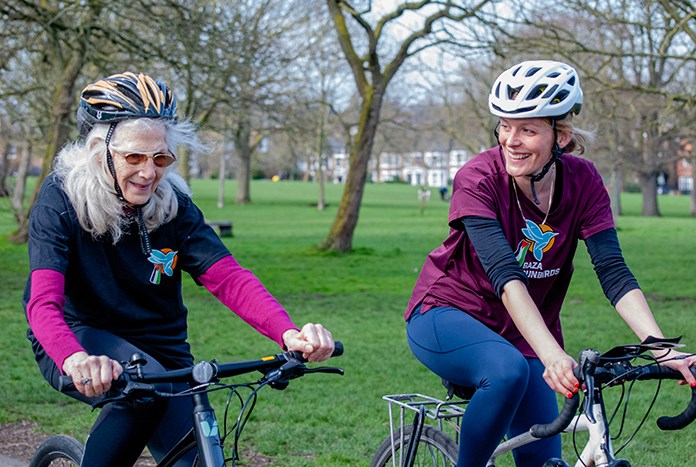 Anne Jones and Meg Williams from Amos Trust on their bikes.