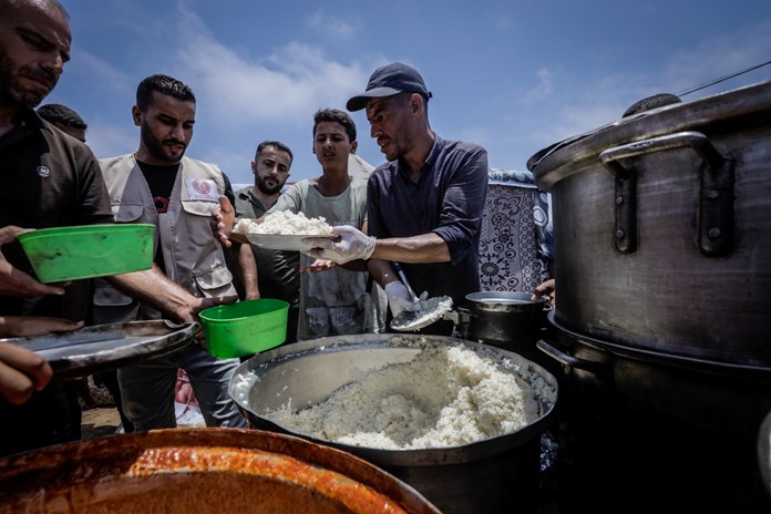 Food being distributed in Rafah, Gaza.