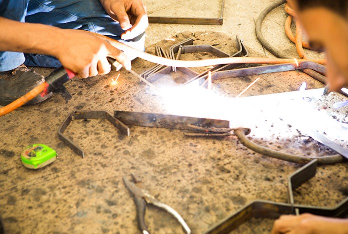 Vocational training in welding at a workshop in Gaza.