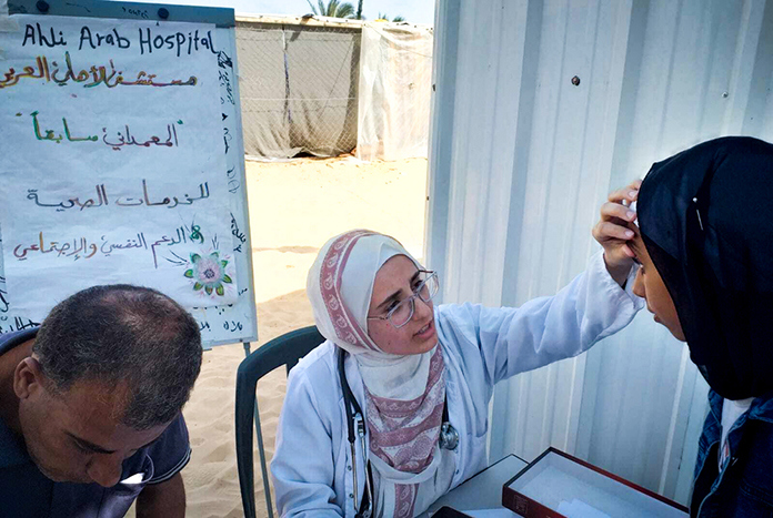 A mobile health clinic set up in Rafah run by staff from Al Ahli Hospital.