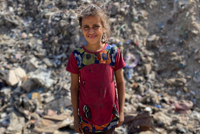 A young girl stands in the rubble of Ah Ahli Hospital in Gaza — 17th July, 2025
