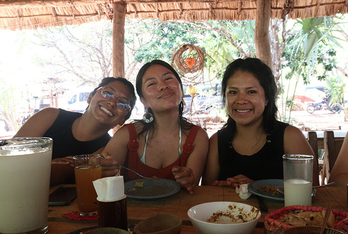 Three members of Amos Trust's Climate Fellowship 2025 cohort relaxing in Mexico.
