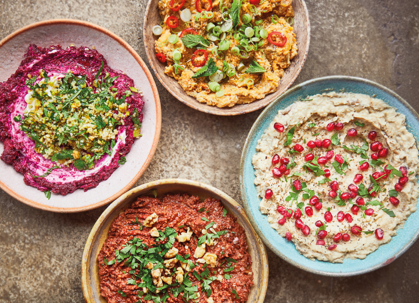 Four delicious plates of Palestinian food.