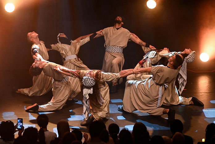 The young people of Alrowwad Culture & Arts Society performing.